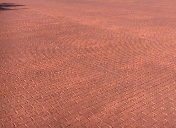 Photo of stamped concrete with brick pattern by CAM Contracting of Orlando